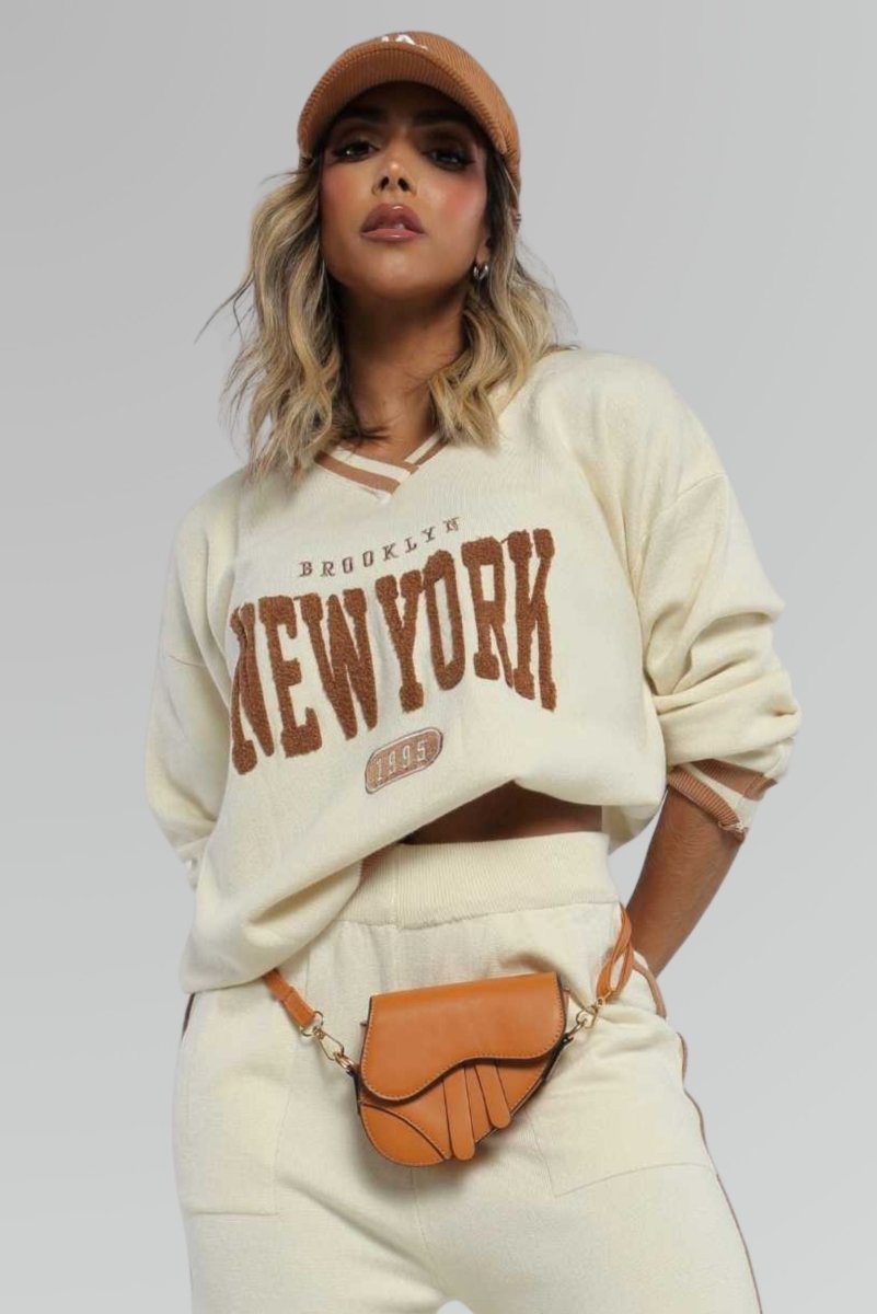 Set beige con aplique "New York" - Lola Mora